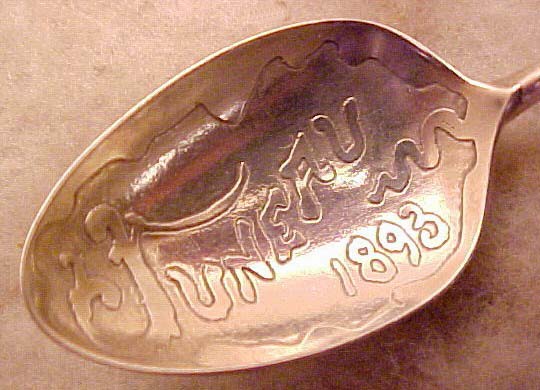For sale: original 1893 Juneau Alaska plique-a-jour
              sterling souvenir spoon
