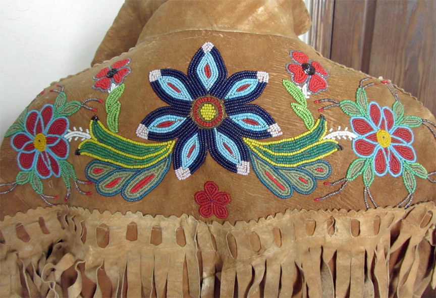 For sale: Wonderful
              Upper Yukon Beaded Moosehide Chief's Jacket.