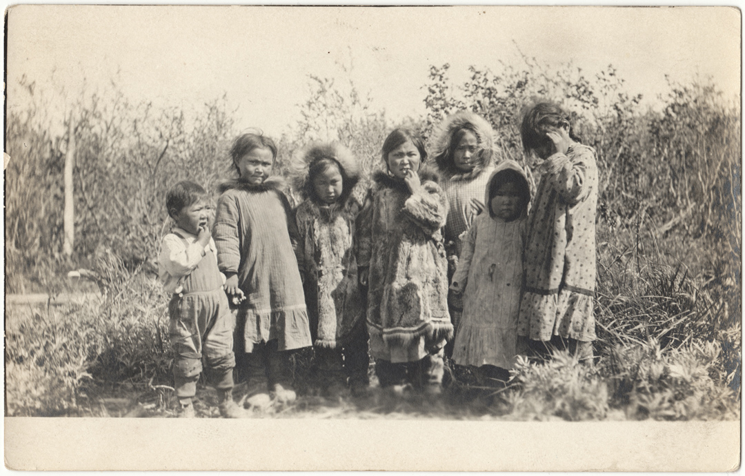 For sale: original
              real photo postcard of Eskimo kids.