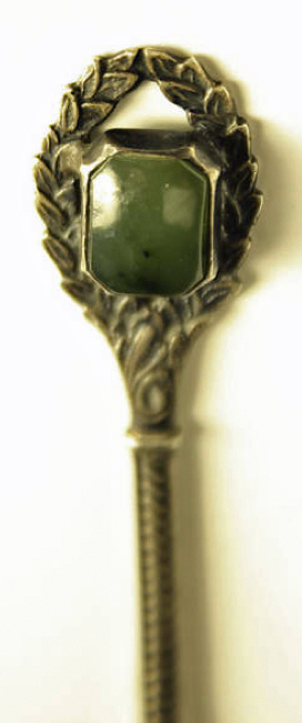 For sale: jade Alaska sterling silver souvenir
                spoon.