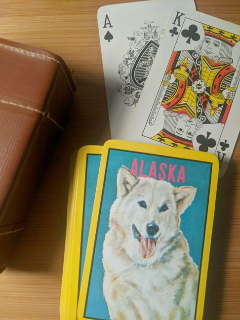 For sale: Alaska mid-century novelty. A vintage
              miniature suitcase with two decks of Alaska playing
              cards.