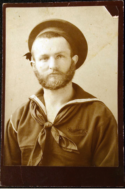 Cabinet card of a sailor taken
        in Sitka, Alaska, by Reuben Albertstone. Anyone recognize this
        man?