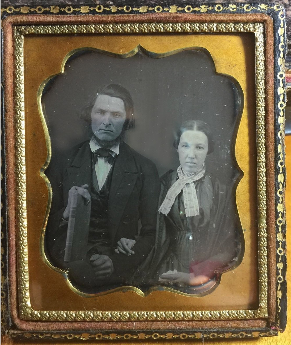 Unidentified daguerreotype of a couple with a book.