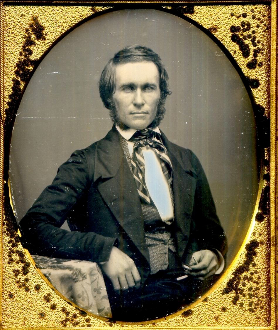 Unidentified daguerreotype of a man with a folding ivory
      rule.
